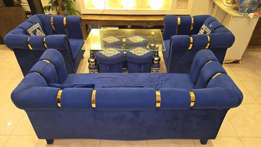5 Seater Sofa Set in Good Condition with one Table and 4 Stools.