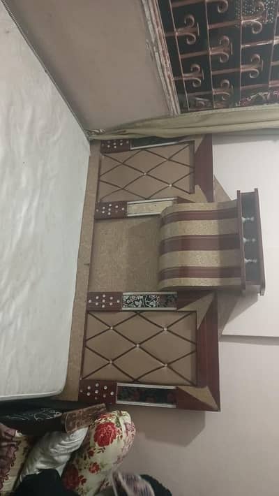 wooden bed with mattress