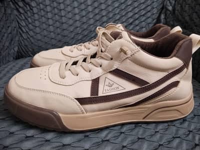 "ENGY" and "MONIKGID sneakers
