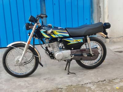 honda125 26 model 10 by 10 condition black colour