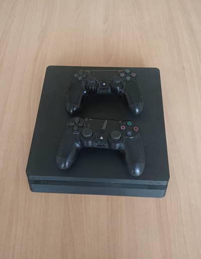 Playstation 4 (PS4) with 5 games for sale