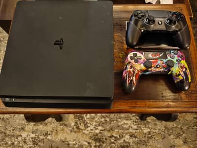 PS4 Slim 500GB Optimal Condition+2 controllers 1 with  Back Triggers