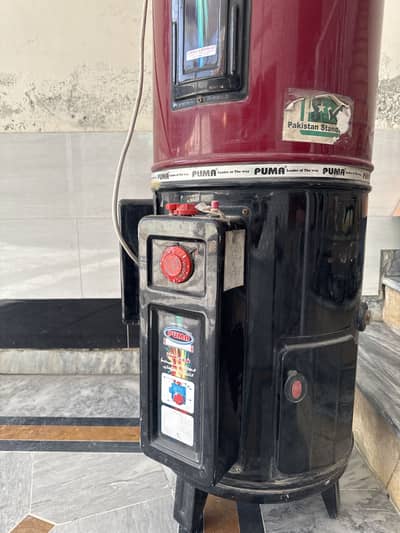 PUMA company geyser two in one electric and gas only two months used