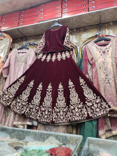 Looks fresh. Velvet ,deep maroon, dabki work. Less than 12 hours worn