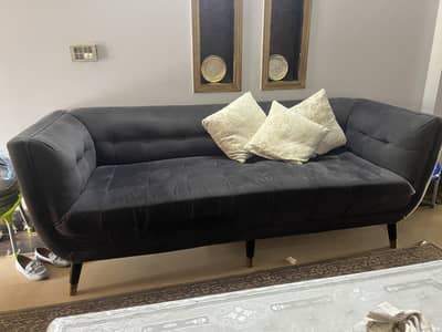 two piece sofa of 6 seater good in condition include center table