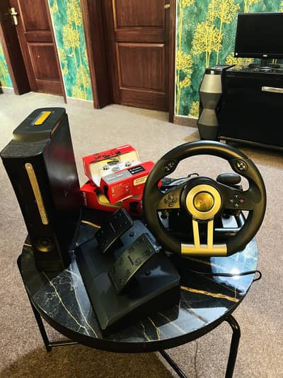 Xbox 360 with Steering wheel setup and 4 controllers