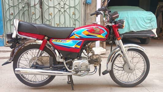 Honda CD 70 2026 model red colour