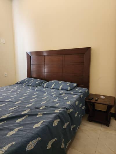 King size wooden bed for sale in reasonable price