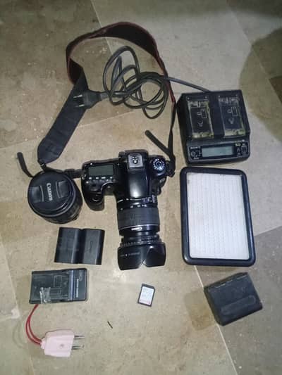 Cacon Eos 60D full setup 2 lenses 18-55 +35-135 mm 2 battery ، LED+