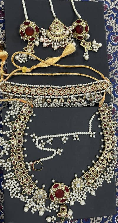 Beautiful choker designer set with maala and an elegant nose wear…