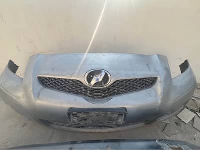 Vitz 2008 - Front back - and headlights Geniun bumper