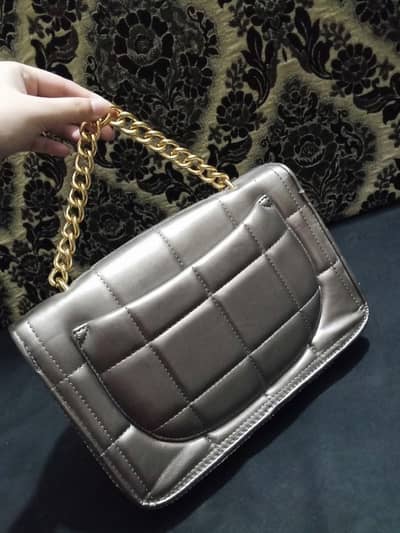 Stylish Metallic Quilted Handbag