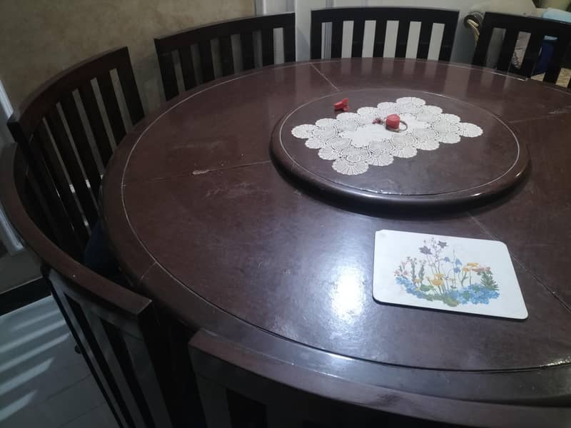 8 seater round dinning with revolving top  solid wood urgent sale 5