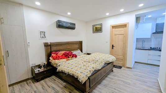 FURNISHED 1-BEDROOM FLAT FOR RENT IN AXIS MALL FAISAL TOWN ISB | GYM, CAR PARKING & EARTH MART INSIDE