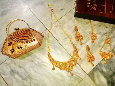 walima set and hand clutch