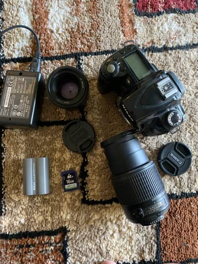 Nikon D90 12.3-megapixel DX-format digital SLR camera with 2 lens