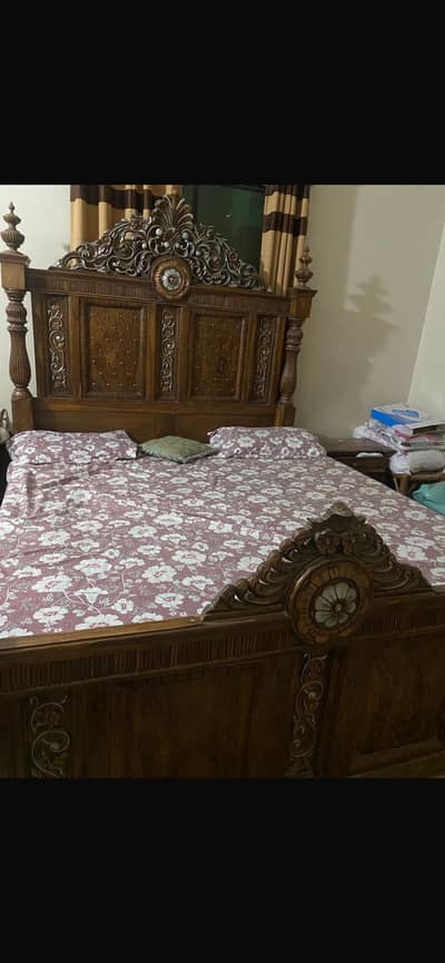 Wooden bed with side tables and dressing table