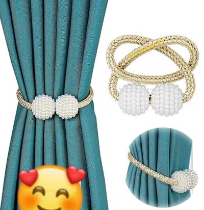 Magnetic curtain tiebacks